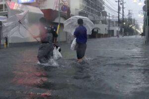 Typhoon Dujuan hits Japan with deadly floods, travel chaos near Tokyo