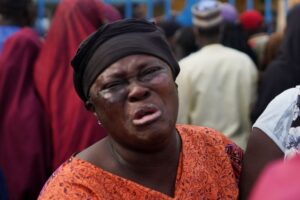 Nigerian forces fire at protesters rallying over deaths of detained miners