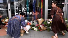 Man charged with attack on Australian MP as suspect’s father says she is family friend